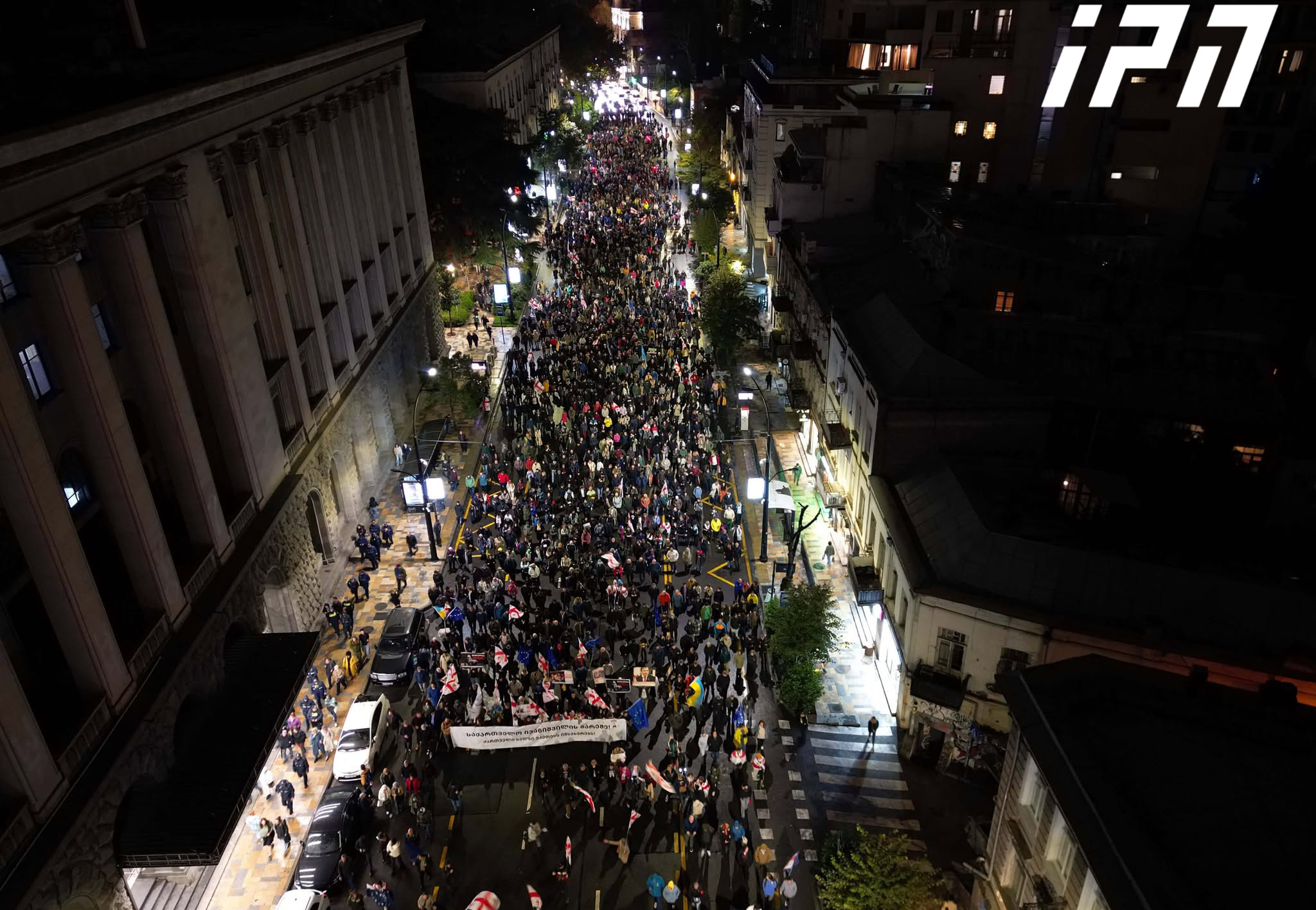Participants in rally organized by opposition parties marching from TSU first building